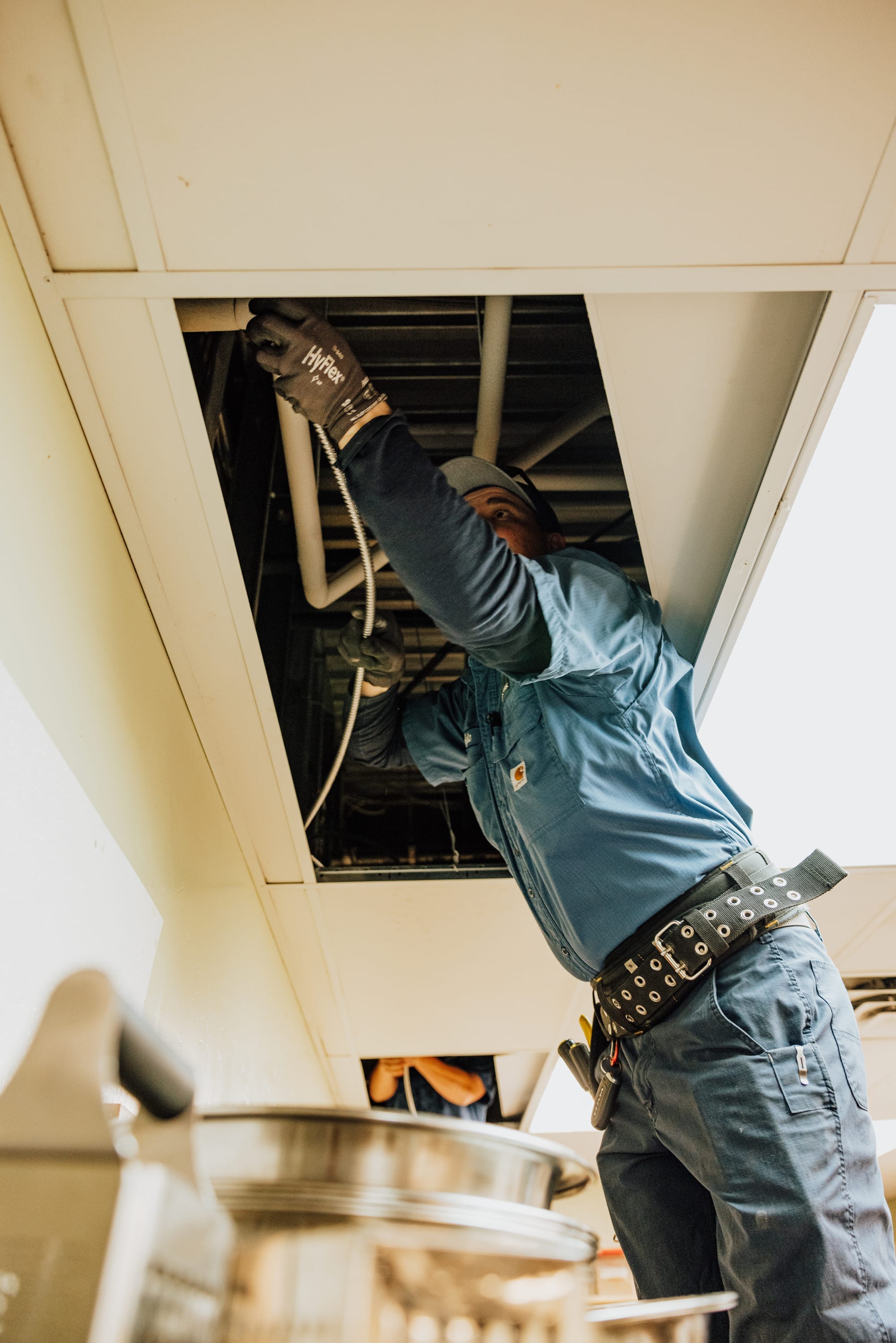 An M&R technician inspecting equipment